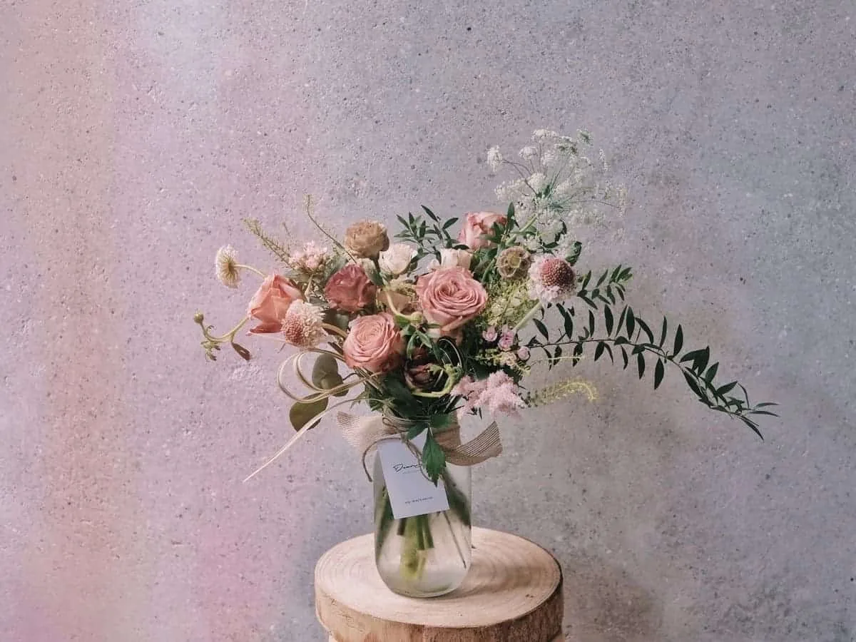 Kenya Cappuccino Rose, Eustoma, Scabiosa Stellata, Scabiosa, Lace Flower, Roses Spray, Queen Anne Lace, Astilbe, Bear Grass, Eucalyptus and greens.